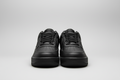 Black Af 1s front view, white professional background
